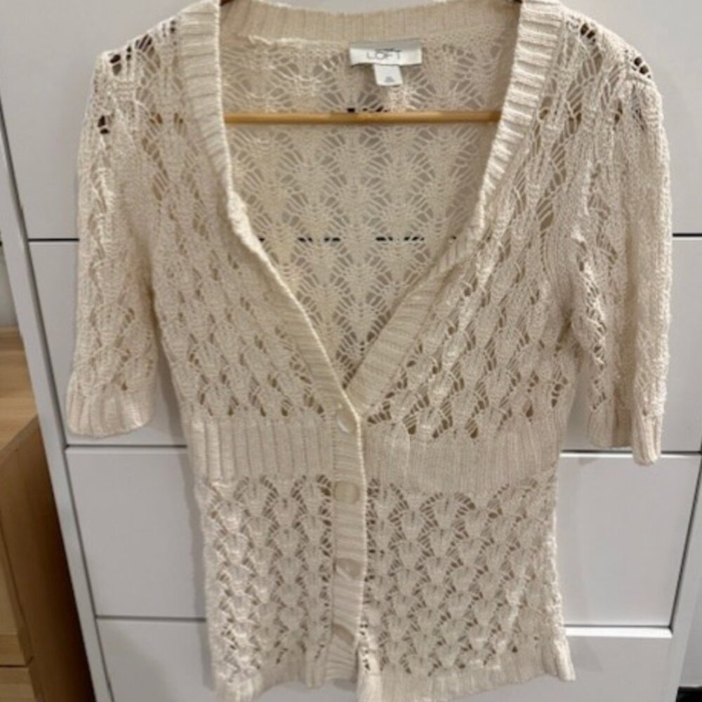 Beautiful ivory colored crotcheted sweater